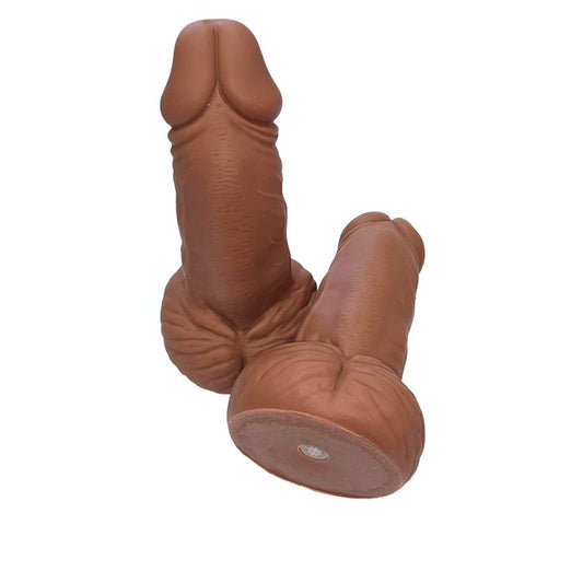 Penis shaped whistle with testicles